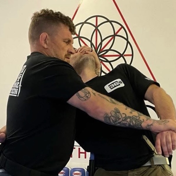Clinch control and close-quarter grappling drill
